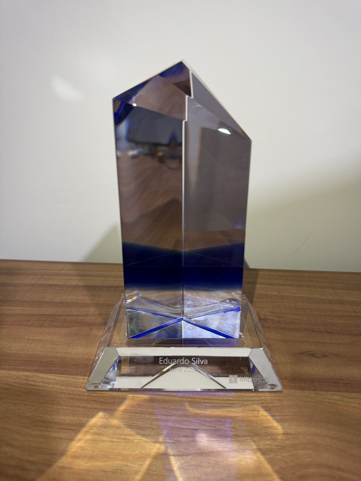Microsoft five-year service crystal engraved with “Eduardo Silva, June 2026”